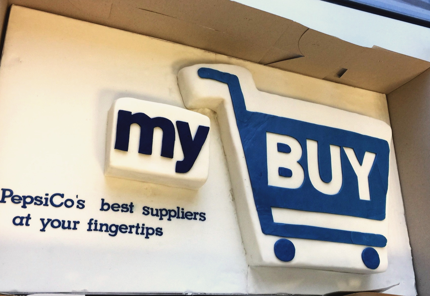 Cake shaped like the PepsiCo myBUY logo